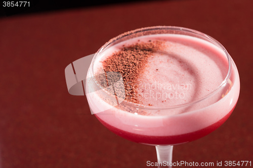 Image of glass with the red cocktail