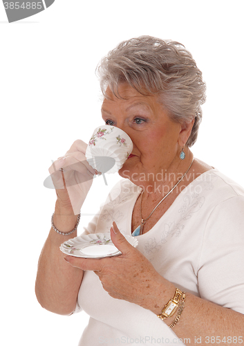 Image of Senior woman drinking coffee.