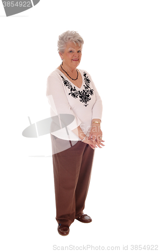 Image of Elderly woman standing full body.