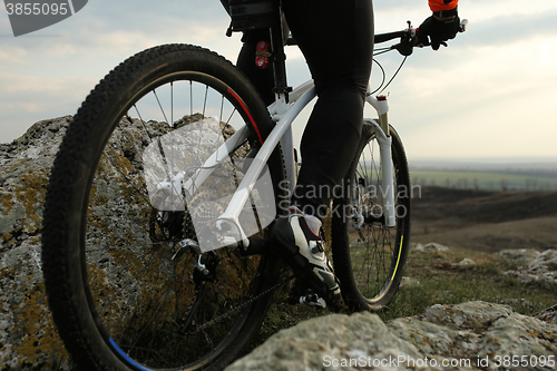 Image of Man cyclist riding the bicycle