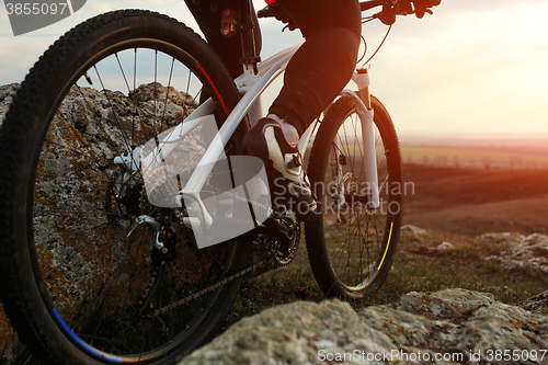 Image of Man cyclist riding the bicycle