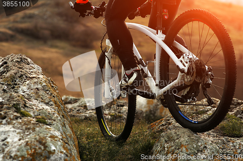 Image of Man cyclist riding the bicycle