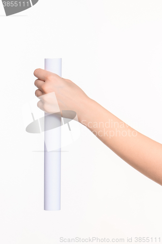 Image of The cylinder female hands on white background