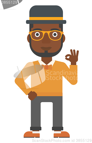 Image of Man gesturing OK sign. 