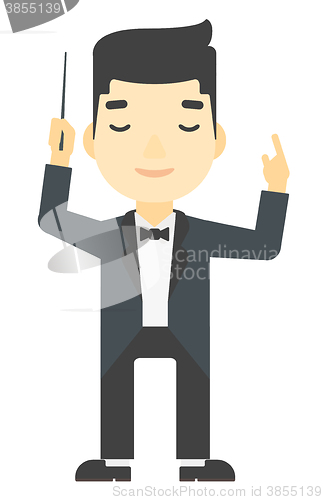 Image of Conductor directing with his baton.