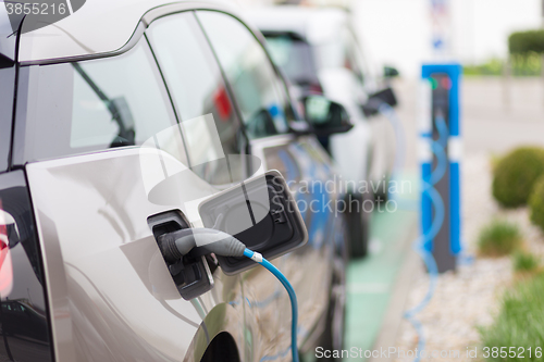 Image of Electric Car in Charging Station.