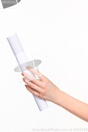 Image of The cylinder female hands on white background