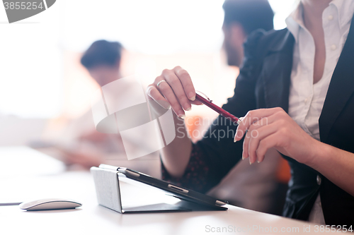 Image of woman hands holding pen on business meeting