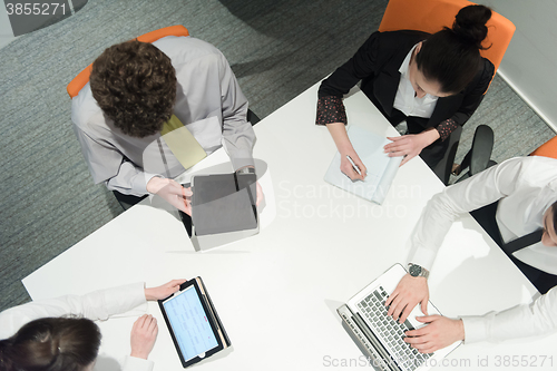 Image of aerial view of business people group brainstorming on meeting