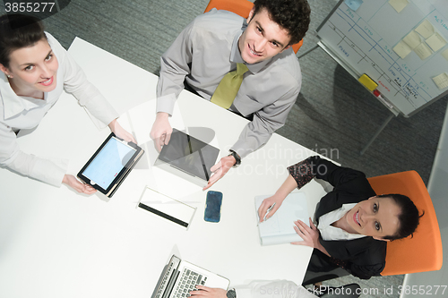 Image of aerial view of business people group brainstorming on meeting