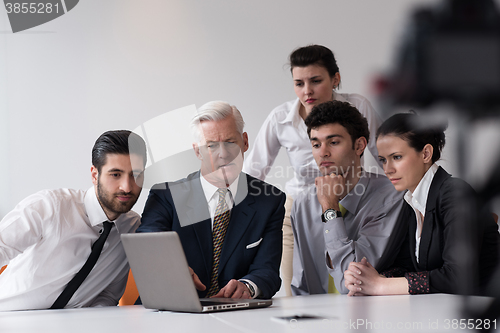 Image of business people group on meeting at modern startup office