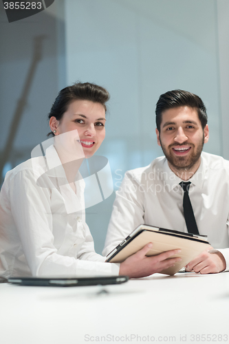 Image of portrait of young  business couple at office