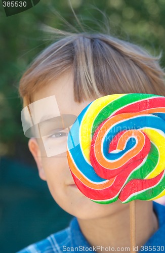 Image of boy with lollipop