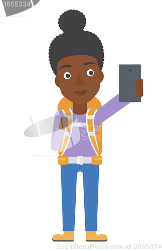 Image of Backpckaer making selfie.