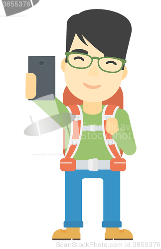 Image of Backpckaer making selfie.