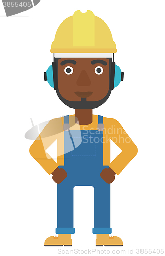 Image of Man wearing hard hat and headphones 