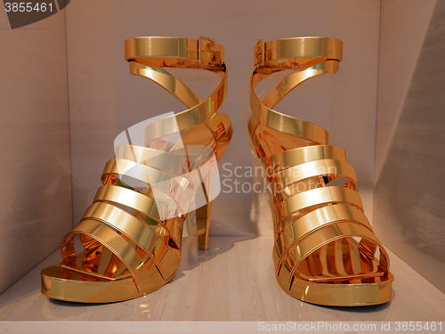 Image of Gold high heels  closeup