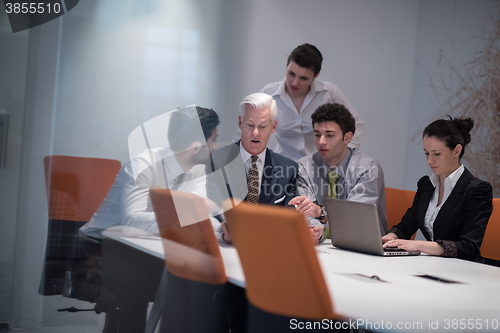 Image of business people group on meeting at modern startup office