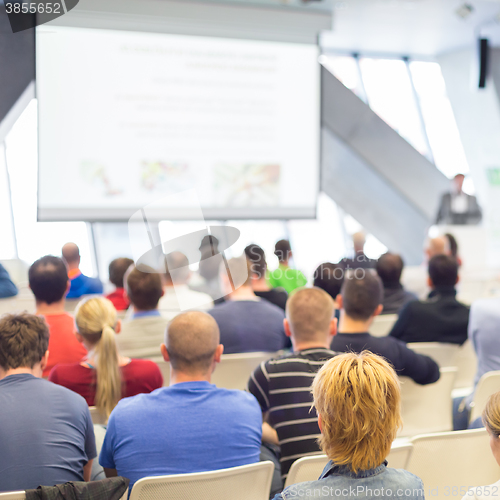 Image of Male speeker having talk at public event.