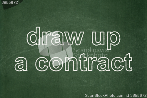 Image of Law concept: Draw up A contract on chalkboard background