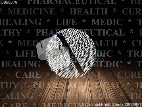 Image of Medicine concept: Pill in grunge dark room