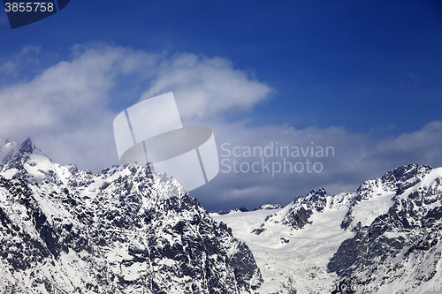 Image of High snowy mountains and glacier at sunny day