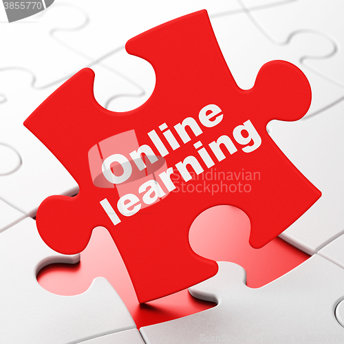 Image of Education concept: Online Learning on puzzle background