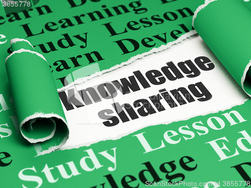 Image of Learning concept: black text Knowledge Sharing under the piece of  torn paper