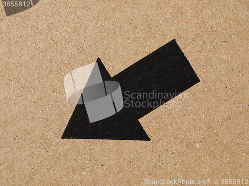 Image of Black arrow on cardboard