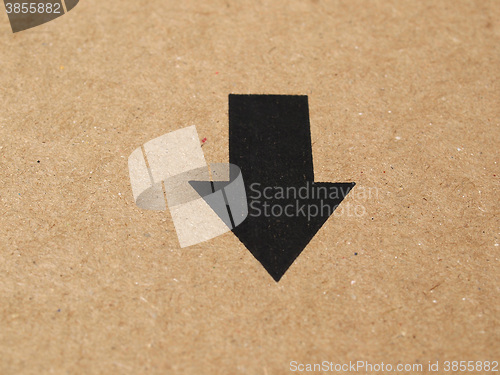 Image of Black arrow on cardboard
