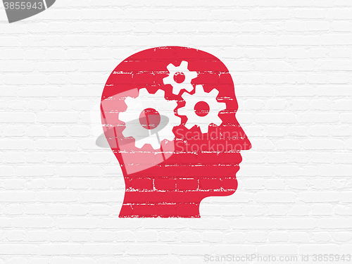 Image of Marketing concept: Head With Gears on wall background