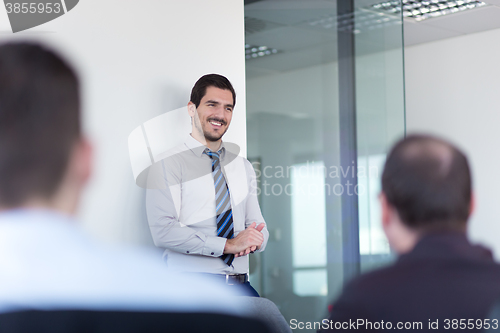 Image of Relaxed informal business team office meeting.