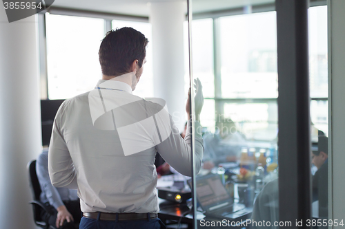 Image of Business team leader delivering presentation in office.