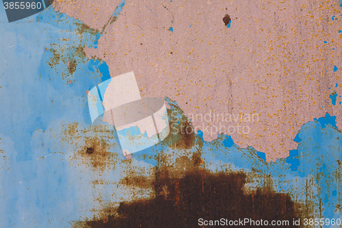 Image of Old blue cracked paint on metal background