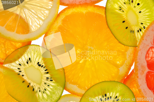 Image of Different sliced juicy citrus 