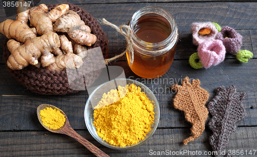 Image of Turmeric powder, honey, healthy food, cosmetic