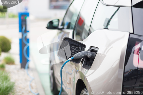 Image of Electric Car in Charging Station.