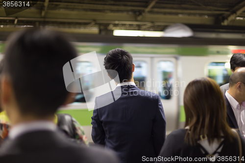 Image of Passengers traveling by Tokyo metro.