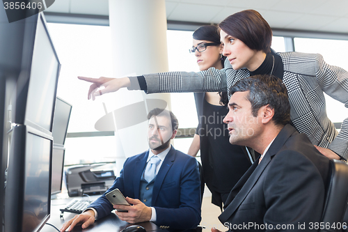 Image of Business team working in corporate office.