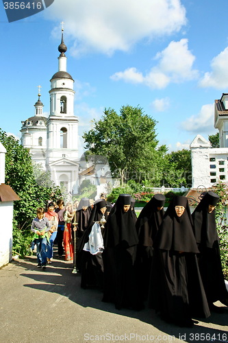 Image of Nuns take part in the religious procession