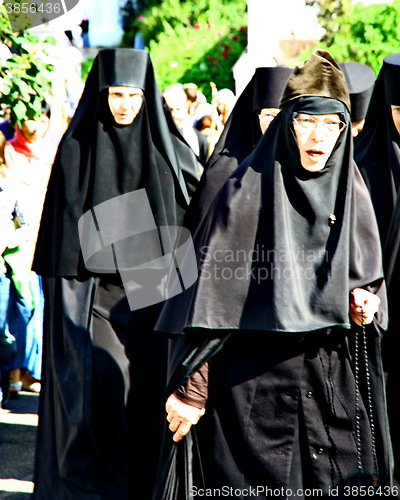 Image of Nuns take part in the religious procession