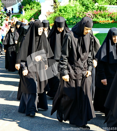 Image of Nuns take part in the religious procession