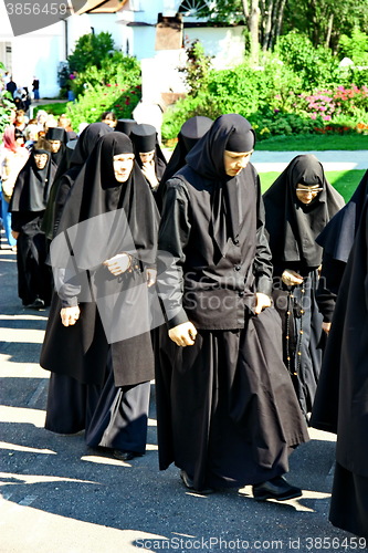 Image of Nuns take part in the religious procession