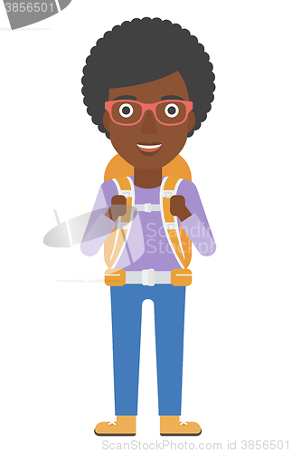 Image of Cheerful woman with backpack .