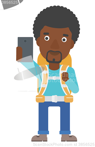 Image of Backpckaer making selfie.