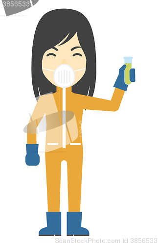 Image of Laboratory assistant with test tube.