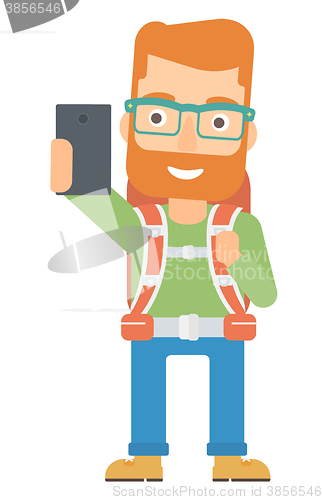 Image of Backpckaer making selfie.