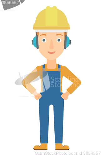 Image of Woman wearing hard hat and headphones 