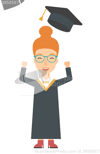 Image of Graduate throwing up her hat.