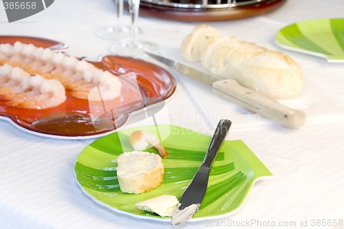 Image of Shrimp Plate with Sliced Bread and Green Plate